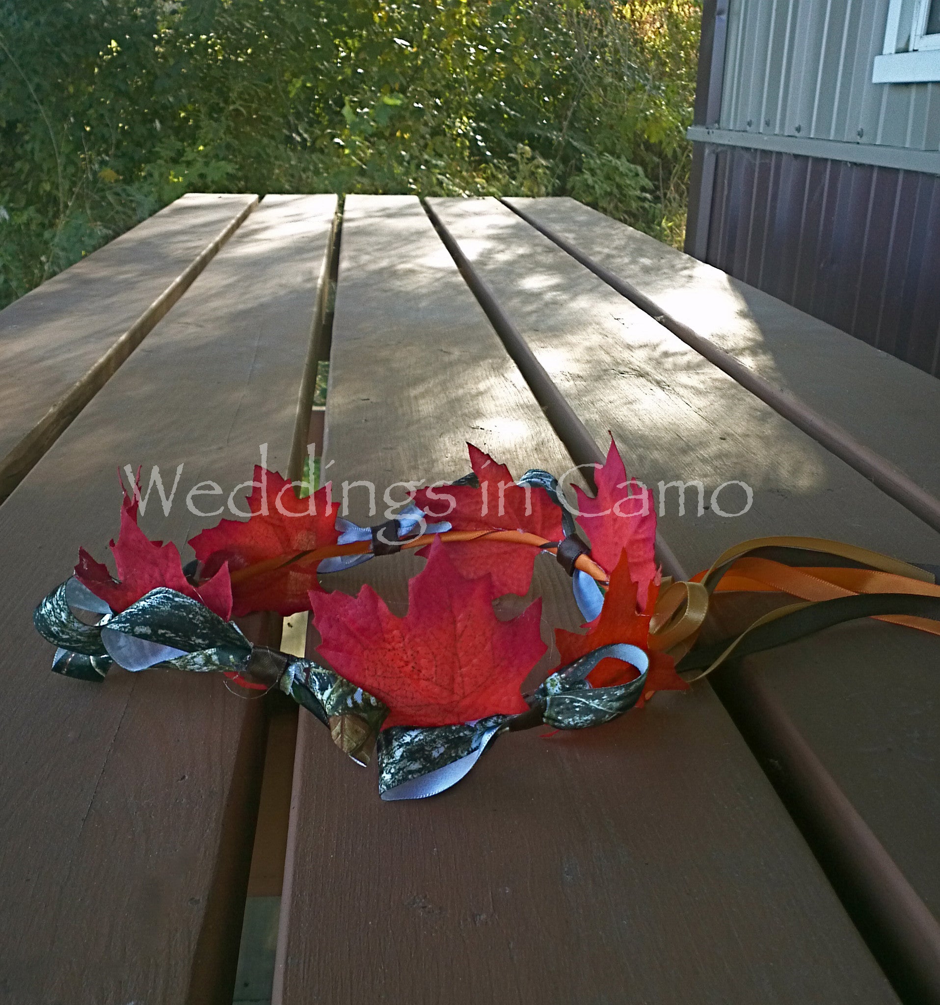 flower girl wreath with leaves and camo ribbon