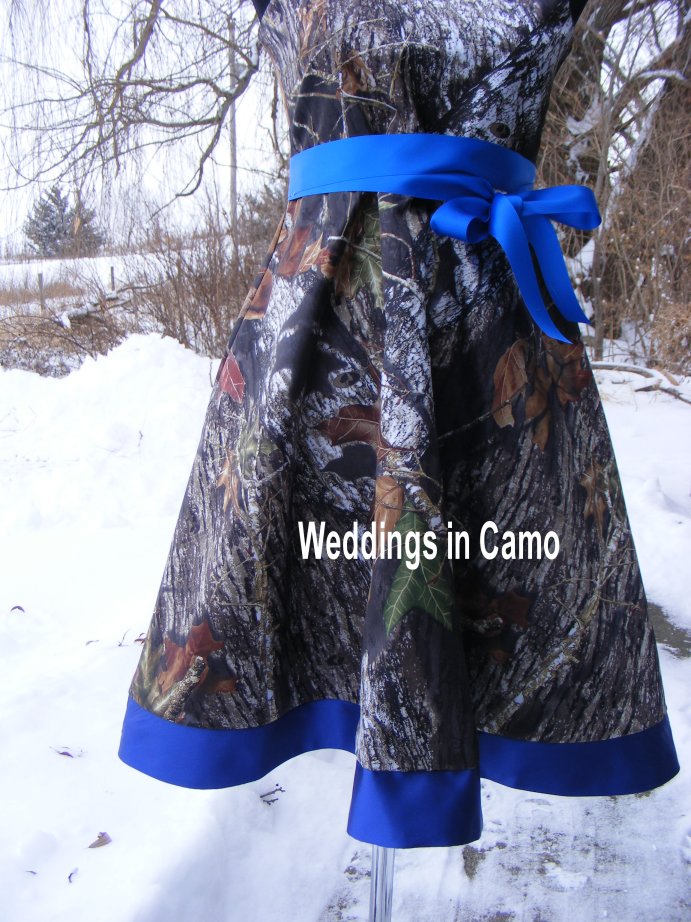 Mossy oak camo flower girl trimmed in royal blue