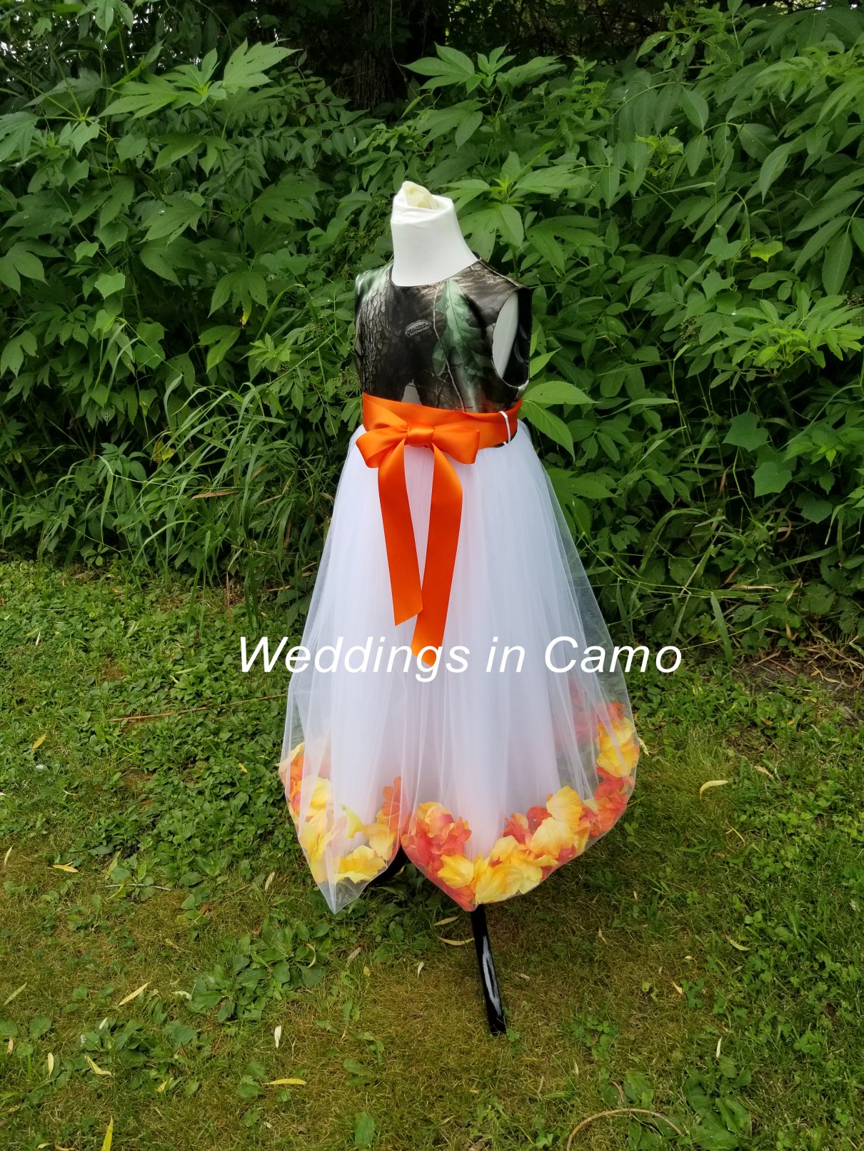 flower girl dresses in Realtree camo and tulle skirt with flower petals