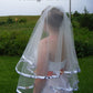 wedding veil trimmed in camo ribbon