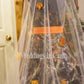 wedding veil with scattered leaves